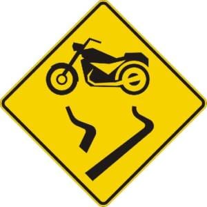 Chaussée glissante pour motocyclettes