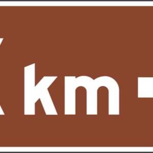 Panonceau de direction à droite X km