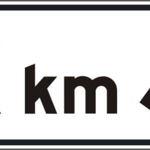 Panonceau de direction flèche oblique à droite et distance